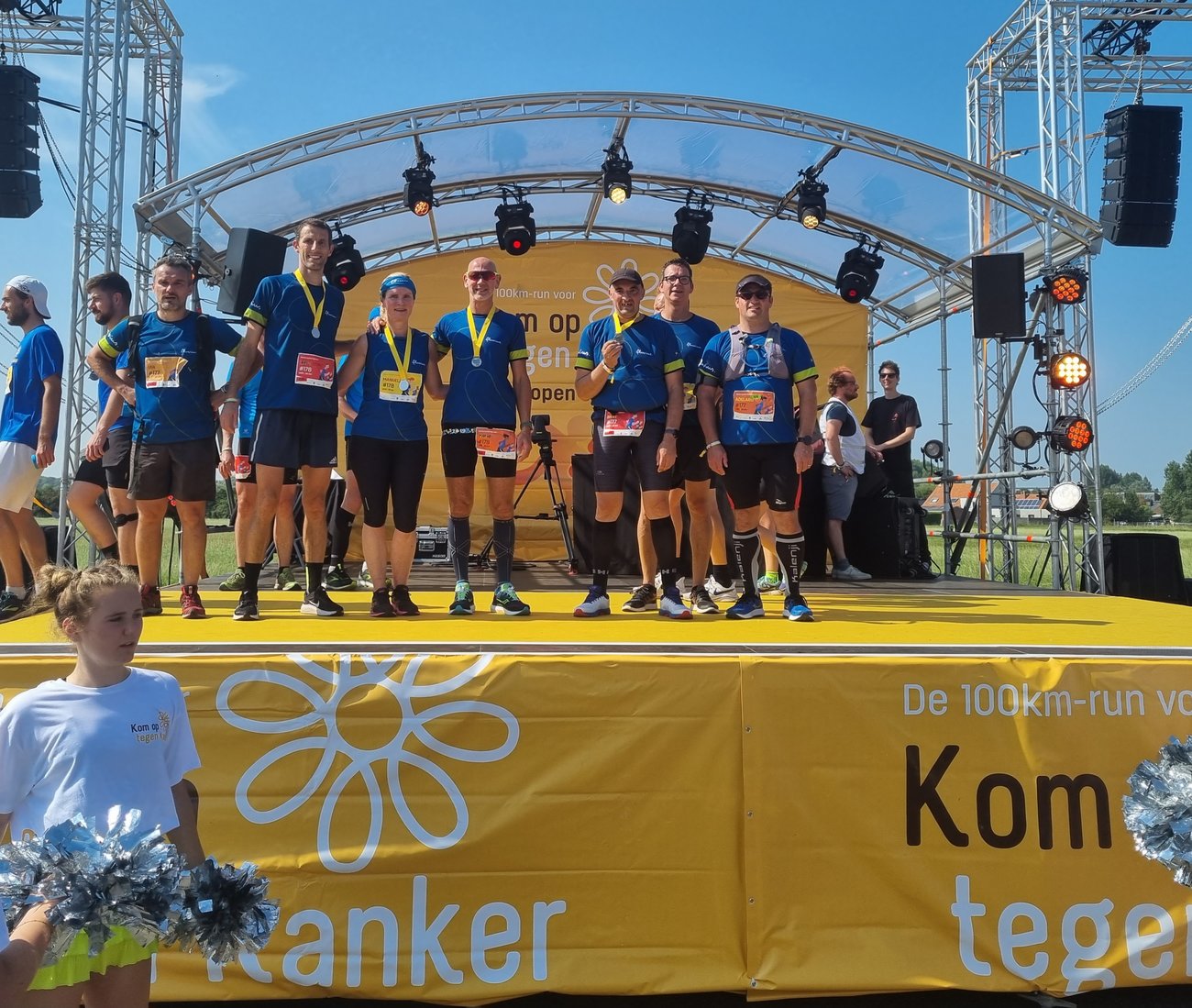 Fluvius fietsploeg op podium tijdens Kom op tegen Kander 